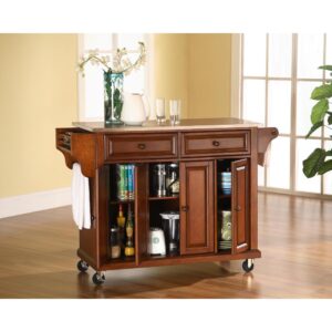 the Full-Size Kitchen Cart adds style and mobile storage to your kitchen. Featuring three cabinets