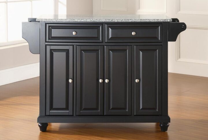 The Cambridge Full-Size Kitchen Island adds enduring style and storage to your kitchen. Featuring three cabinets