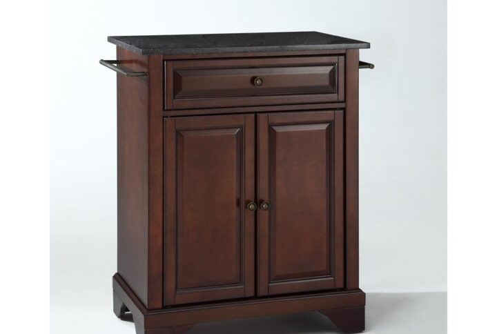 Save valuable space with the Lafayette Compact Kitchen Island. Featuring a large cabinet with an adjustable shelf