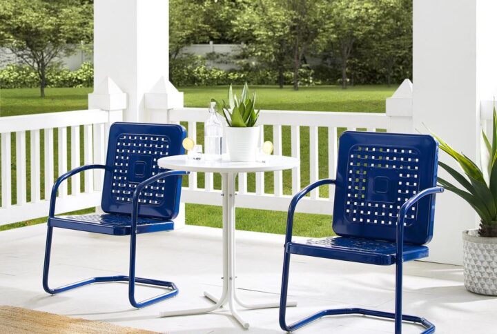 Nostalgia abounds with the Bates 3pc Bistro Set. Two vintage-style chairs in vibrant colors surround a simple metal bistro table for a fun and functional outdoor lounging experience. Each chair features a square back with a unique basket weave design that allows air to circulate. With a cantilever base
