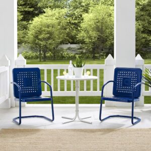 the chairs offer just enough flex for relaxing outdoors. The table’s sturdy pedestal base is comprised of four metal legs and easily tucks between the chairs