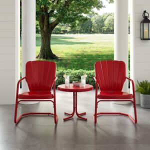 the Ridgeland 3pc Outdoor Chair Set brings class and charm to your outdoor space. Two vintage-style chairs in vibrant colors surround a simple metal side table for a fun and functional outdoor lounging experience. Each patio chair features a clamshell back with decorative grooves