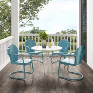 the Tulip 5pc Dining Set combines vintage style with classic function. Four scalloped chairs in vibrant colors surround a simple metal dining table for a fun and functional outdoor dining experience. The retro silhouette of each chair sits atop a cantilever base that provides a relaxed seat for dining al fresco.