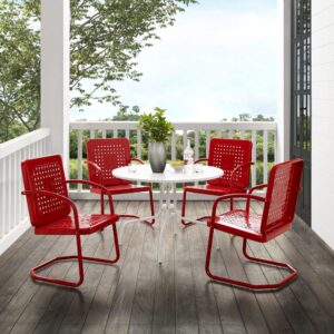 Nostalgia abounds with the Bates 5pc Dining Set. Four vintage-style chairs in vibrant colors surround a simple metal dining table for a fun and functional outdoor lounging experience. Each chair features a square back with a unique basket weave design that allows air to circulate. With a cantilever base