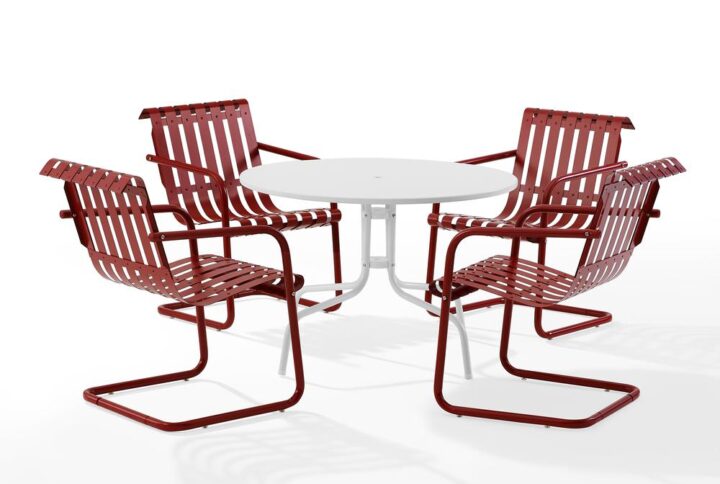 The Gracie 5pc Dining Set combines fashion and function in a colorful retro package. This set features four slatted chairs with cantilever bases surrounding a simple metal dining table. Relax and dine in vintage style with this classic table and chair set.