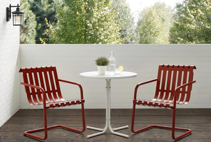 The Gracie 3pc Bistro Set combines fashion and function in a colorful retro package. This set features two slatted chairs with cantilever bases surrounding a simple pedestal bistro table. Ideal for a small balcony or patio