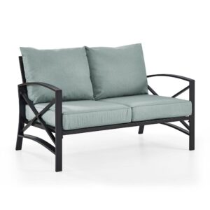 Enjoy your morning coffee in cushioned comfort with the Kaplan Loveseat. Made from sturdy powder-coated steel