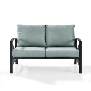 this two-seat outdoor sofa offers deep cushioned seats covered with solution-dyed polyester. Featuring a sleek frame with an eye-catching x-back design
