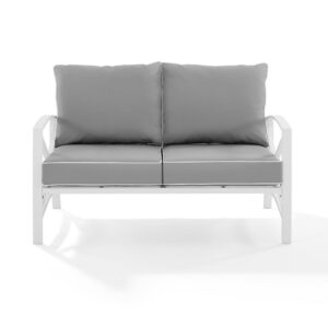 Enjoy your morning coffee in cushioned comfort with the Kaplan Loveseat. Made from sturdy powder-coated steel