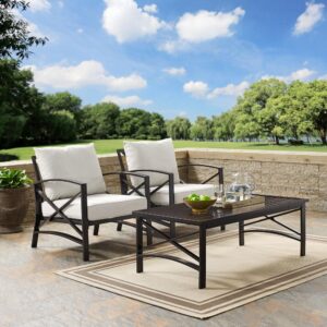 this outdoor furniture set features sturdy steel construction with a transitional x-back design. The comfortable seat and back cushions of each patio chair are covered in solution-dyed polyester