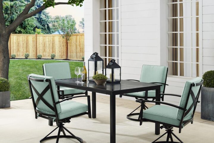 Gather around for a fun and fashionable outdoor meal with the Kaplan 5pc Outdoor Dining Set. Featuring a rectangle table with a slatted design that elevates the sturdy steel construction