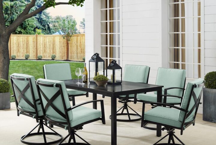 Gather around for a fun and fashionable outdoor meal with the Kaplan 7pc Outdoor Dining Set. Featuring a rectangle table with a slatted design that elevates the sturdy steel construction