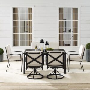 this set will be a welcome addition to your outdoor retreat. Design elements like x-back chairs and a slatted tabletop elevate the sturdy steel construction of the set. The cushions on the seat and chair backs offer comfort