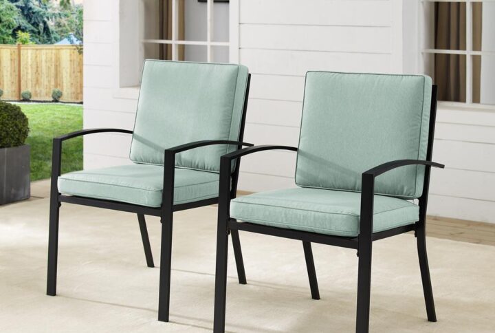 Dine outdoors in classic style with the Kaplan 2pc Dining Chair Set. The weather-resistant steel provides a sturdy framework for the cushioned seating