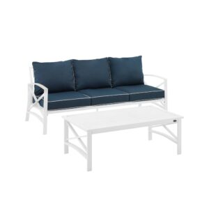 this set features sturdy steel construction with a transitional x-back design. The sofa's comfortable seat and back cushions are covered in solution-dyed polyester