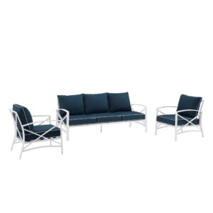 this set features sturdy steel construction with a transitional x-back design. Both the sofa and chairs have comfortable seat and back cushions covered with solution-dyed polyester in a variety of colors. Sit down for a conversation with friends and enjoy the classic beauty of the Kaplan sofa set.