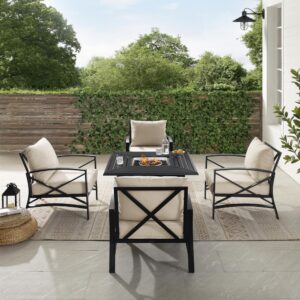 the fire table's simple design blends with a variety of outdoor spaces. The gas controls and a rack for a propane tank are located inside the table's base