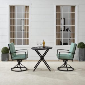 the Kaplan 3pc Bistro Set creates an intimate outdoor dining space. Two cushioned swivel dining chairs feature weather-resistant cushion covers and pair beautifully with the powder-coated steel folding table. With a classic slatted top