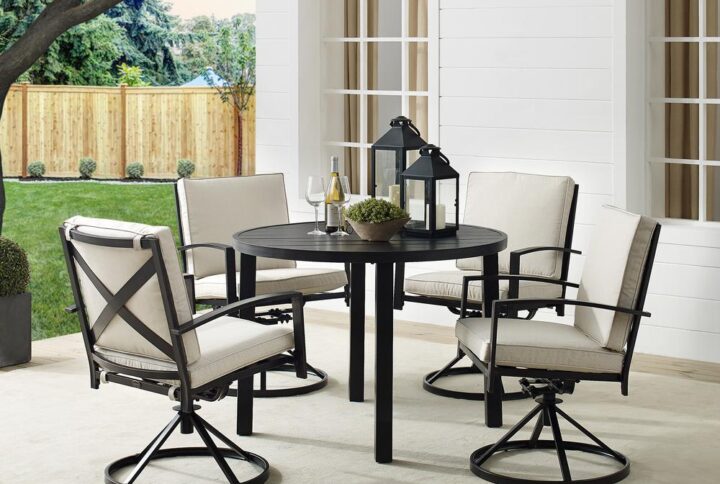 Gather around for a fun and fashionable outdoor meal with the Kaplan 5pc Round Dining Set. Constructed of sturdy steel
