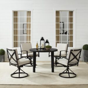 this set features a round table with a slatted design and four swivel dining chairs. Each chair showcases comfy back and seat cushions plus a classic x-back design and 360-degree swivel. The table’s standard umbrella hole will allow you to add some shade when dining on a hot summer day. Simple and stunning