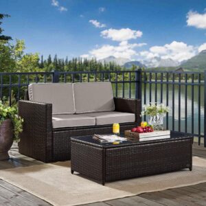 the Palm Harbor 2pc Conversation Set provides lasting comfort and style. The loveseat features moisture-resistant cushions and deep seating perfect for relaxing in the summer sun