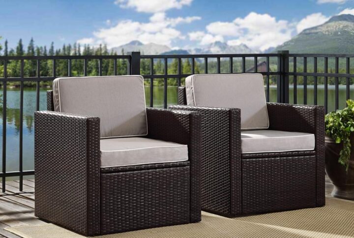 Lounge in comfort with the Palm Harbor 2pc Outdoor Chair Set. Crafted with all-weather resin wicker woven over durable steel
