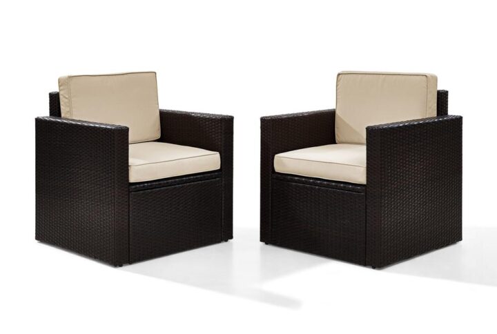 Lounge in comfort with the Palm Harbor 2pc Outdoor Chair Set. Crafted with all-weather resin wicker woven over durable steel