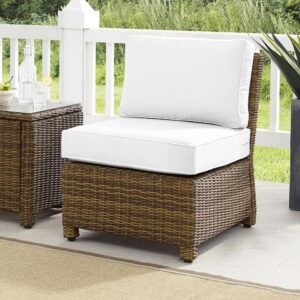 Outdoor lounging has never been more versatile than with the Bradenton Sectional Center Chair. The sturdy steel frame is wrapped in beautiful all-weather wicker with a modular design for flexibility. Enjoy the look of bright white outdoor cushions worry-free. Featuring thick cushions covered in high-quality Sunbrella fabric