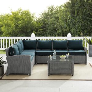 the Bradenton 5pc Sectional Set fits the bill. The sturdy steel frame is wrapped in beautiful all-weather wicker and topped with moisture-resistant cushions