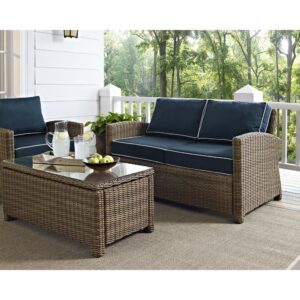 the Bradenton Loveseat fits the bill. The sturdy steel frame is wrapped in beautiful all-weather wicker and topped with moisture-resistant cushions. With gently arched arms and deep seating