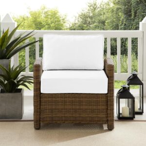 the Bradenton Armchair fits the bill. The sturdy steel frame is wrapped in beautiful all-weather wicker with gently arched arms for comfort. Enjoy the look of bright white outdoor cushions worry-free. Featuring a thick cushion covered in high-quality Sunbrella fabric