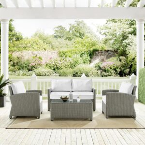 the Bradenton 4pc Conversation Set fits the bill. Each piece of the set features sturdy steel frames wrapped in beautiful all-weather wicker. Enjoy the look of bright white outdoor cushions worry-free. The loveseat and armchair cushions are covered in high-quality Sunbrella fabric that resists staining