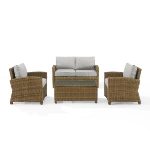 the Bradenton 4pc Conversation Set fits the bill.  Each piece of the set features sturdy steel frames wrapped in beautiful all-weather wicker. The loveseat and armchairs are stylish and comfortable with gently arched arms and thick moisture-resistant cushions. A glass top coffee table ties the seating arrangement together