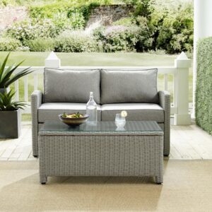 the Bradenton 2pc Conversation Set fits the bill. The sturdy steel frames of the loveseat and coffee table are wrapped in beautiful all-weather resin wicker. The loveseat is stylish and comfortable with gently arched arms and thick moisture-resistant cushions. A glass-top coffee table makes outdoor relaxation a breeze with the Bradenton conversation set.