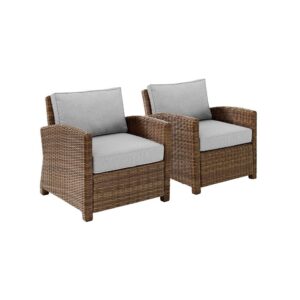 Outdoor relaxation has never looked better than with the Bradenton 2pc Outdoor Chair Set. The sturdy steel frames are wrapped in beautiful all-weather wicker and topped with moisture-resistant cushions. With gently arched arms and deep seating