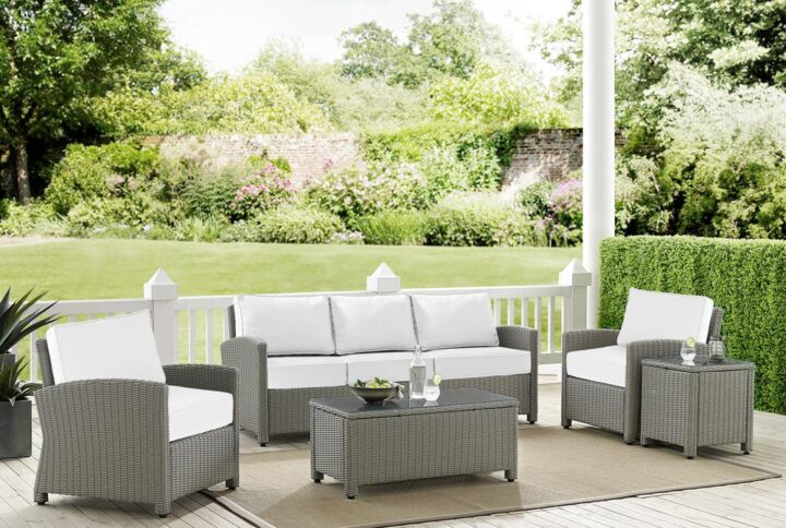 Create a relaxing retreat on your patio or deck with the Bradenton 5pc Sofa Set. Each piece of the set features sturdy steel frames wrapped in beautiful all-weather wicker. Enjoy the look of bright white outdoor cushions worry-free. The sofa and armchair cushions are covered in high-quality Sunbrella fabric that resists staining