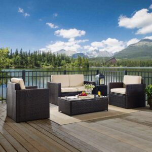 the Palm Harbor 5pc Conversation Set provides lasting comfort and style. Both the loveseat and chairs feature moisture-resistant cushions and deep seating perfect for relaxing in the summer sun. The glass-top coffee table and all-wicker side table offer ample table space for outdoor entertaining