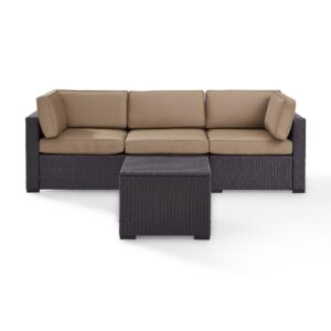 both the sofa and coffee table feature all-weather resin wicker woven over durable powder-coated steel frames.  The thick moisture-resistant cushions of the sofa offer deep