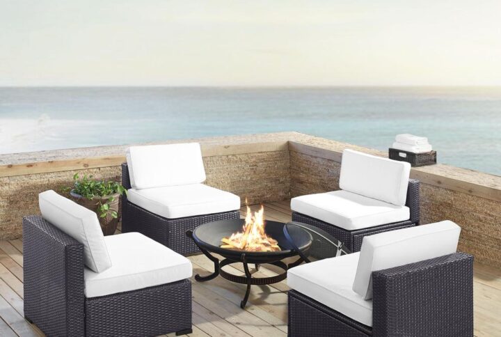 Entertaining outdoors is effortless with the Biscayne 5pc Chair Set.  The four armless chairs have durable powder-coated steel frames covered in beautiful all-weather resin wicker. Each seat is topped with lush dyed yarn polyester cushion covers