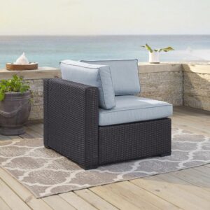 the Biscayne Corner Chair features all-weather resin wicker over a powder-coated steel frame. Providing a deep seat with lush moisture-resistant cushions