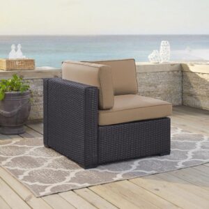 the Biscayne Corner Chair features all-weather resin wicker over a powder-coated steel frame. Providing a deep seat with lush moisture-resistant cushions
