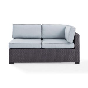 this loveseat features all-weather resin wicker woven over a durable powder-coated steel frame. Thick moisture-resistant cushions offer deep