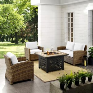 Spend warm sunny days and cool autumn nights with the Bradenton 4pc Conversation Set. The loveseat and armchairs are made from all-weather resin wicker over powder-coated steel frames. Enjoy the look of bright white outdoor cushions worry-free. Featuring thick cushions covered in high-quality Sunbrella fabric