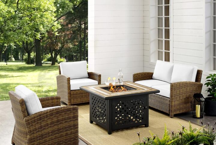 Spend warm sunny days and cool autumn nights with the Bradenton 4pc Conversation Set. The loveseat and armchairs are made from all-weather resin wicker over powder-coated steel frames. Enjoy the look of bright white outdoor cushions worry-free. Featuring thick cushions covered in high-quality Sunbrella fabric