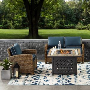 Spend warm summer days and cool summer nights with the Bradenton 3pc Conversation Set. The loveseat and armchair are made from all-weather resin wicker with seat cushions covered in solution-dyed polyester. The outdoor seating surrounds a fire table constructed from sturdy powder-coated steel. The fire table's tiled top and lattice paneled base offer a unique design that will elevate your outdoor space. The gas controls and a rack for a propane tank are located inside the table's base