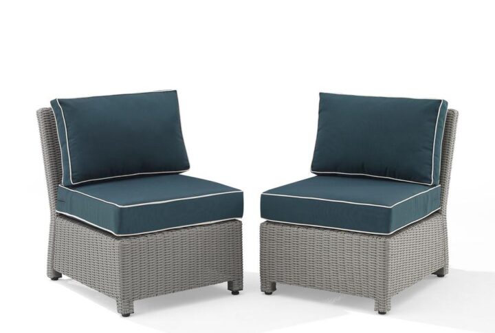 Outdoor relaxation has never looked better than with the Bradenton 2pc Armless Chair Set. The sturdy steel frames are wrapped in beautiful all-weather wicker and topped with moisture-resistant cushions. With a versatile modular design and deep seating