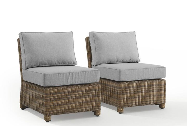 Outdoor relaxation has never looked better than with the Bradenton 2pc Armless Chair Set. The sturdy steel frames are wrapped in beautiful all-weather wicker and topped with moisture-resistant cushions. With a versatile modular design and deep seating