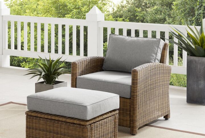 Kick back and prop up your feet with the Bradenton 2pc Outdoor Chair Set. Both the chair and ottoman have sturdy steel frames wrapped in beautiful all-weather wicker. Topped with moisture-resistant cushions