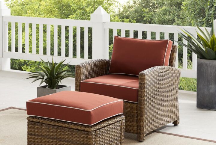 Kick back and prop up your feet with the Bradenton 2pc Outdoor Chair Set. Both the chair and ottoman have sturdy steel frames wrapped in beautiful all-weather wicker. Topped with moisture-resistant cushions