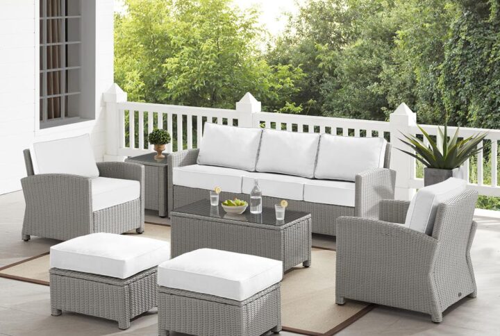 Spend warm sunny days and cool autumn nights with the Bradenton 7Pc Sofa Set. Each piece of the set has a sturdy steel frame wrapped in all-weather resin wicker. Enjoy the look of bright white outdoor cushions worry-free. Featuring thick cushions covered in high-quality Sunbrella fabric